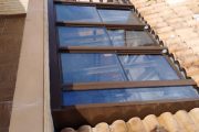 Cerramiento de Aluminio formado por techo móvil motorizado