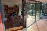 Cerramiento  con sistema de corredera paralela con fijos en PVC