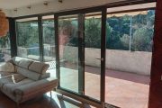 Cerramiento  con sistema de corredera paralela con fijos en PVC