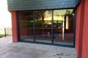 Cerramiento  con sistema de corredera paralela con fijos en PVC