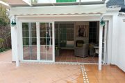 Cerramiento de PVC mediante ventana plegable