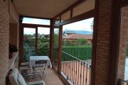 Cerramiento de porche en PVC imitación madera