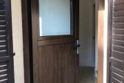 Puerta de PVC imitación madera Nogal
