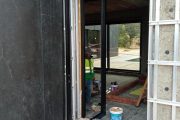 Puerta pivotante apertura exterior