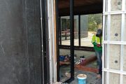 Puerta pivotante apertura exterior