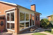 Cerramiento de porche con correderas de PVC