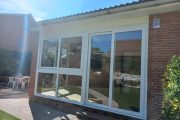Cerramiento de porche con correderas de PVC